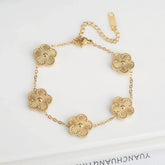 Stainless steel clover bracelet with four leaf charm design
