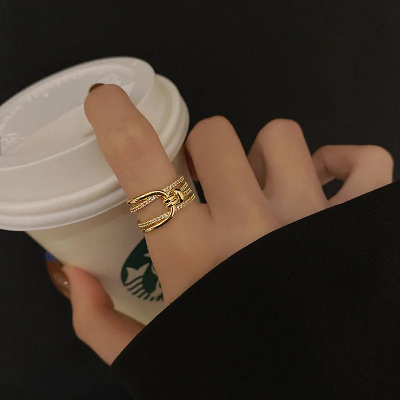 Gold palm leaf adjustable ring with zircon design
